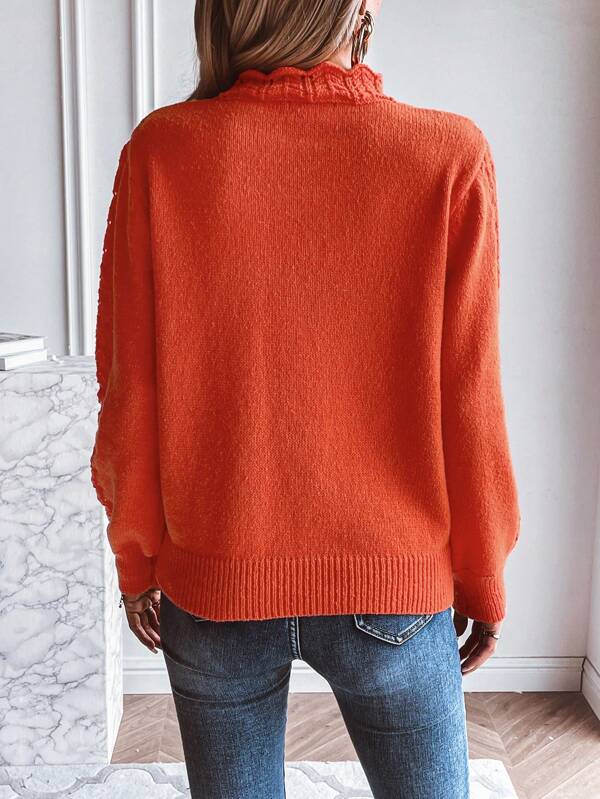 Kira - Pullover orange - Collier debout - style et confort