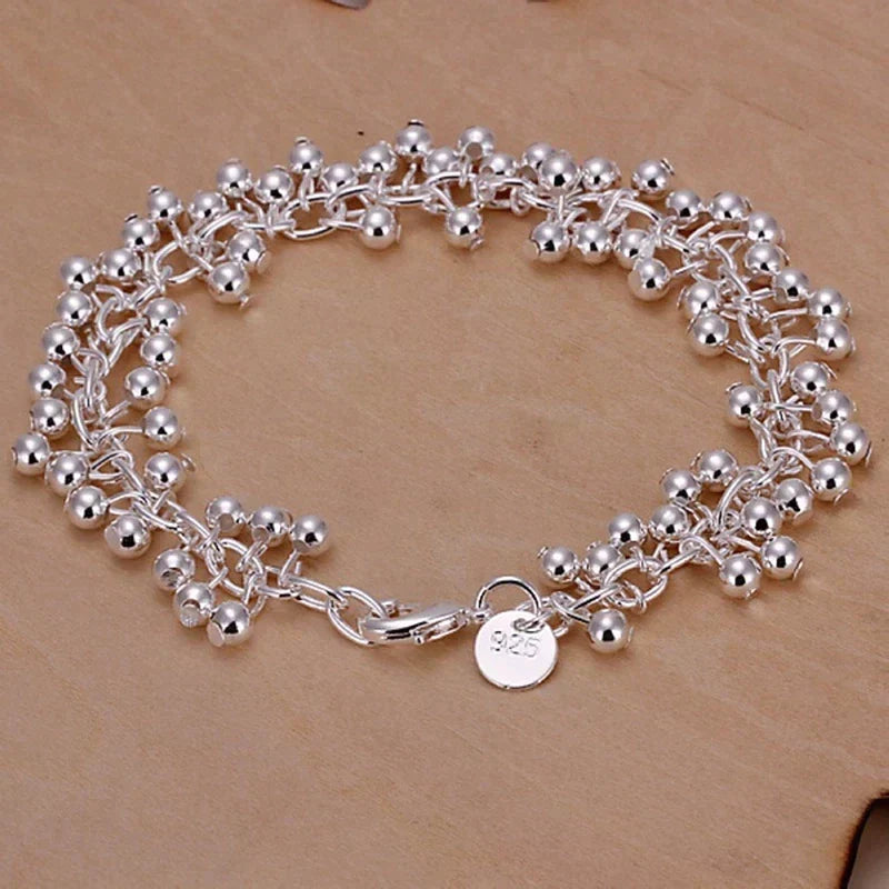 Nova - Bracelet de perles en argent avec un design détaillé