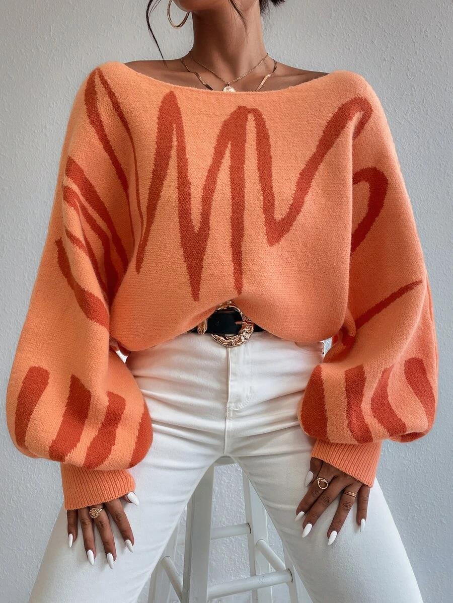 Talia - Pull oversize orange à manches bouffantes