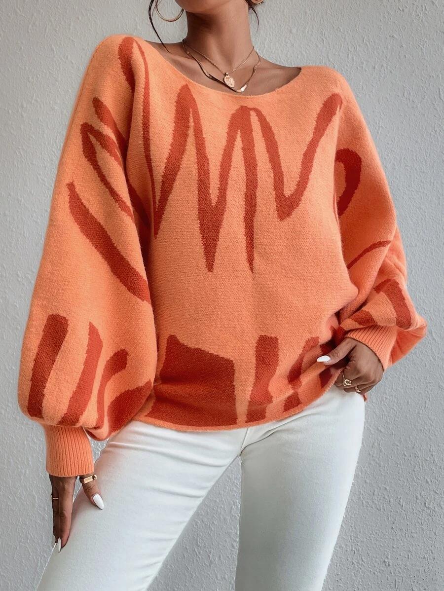 Talia - Pull oversize orange à manches bouffantes