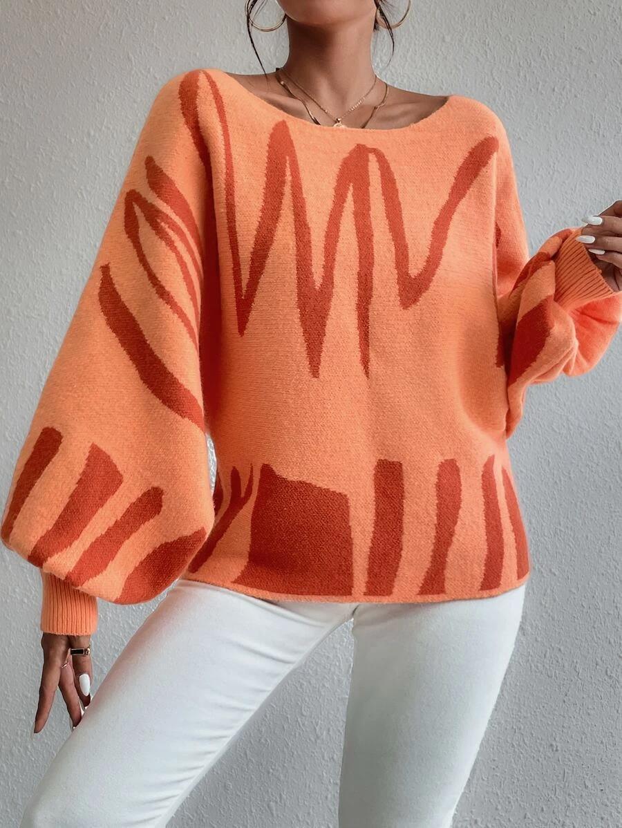 Talia - Pull oversize orange à manches bouffantes